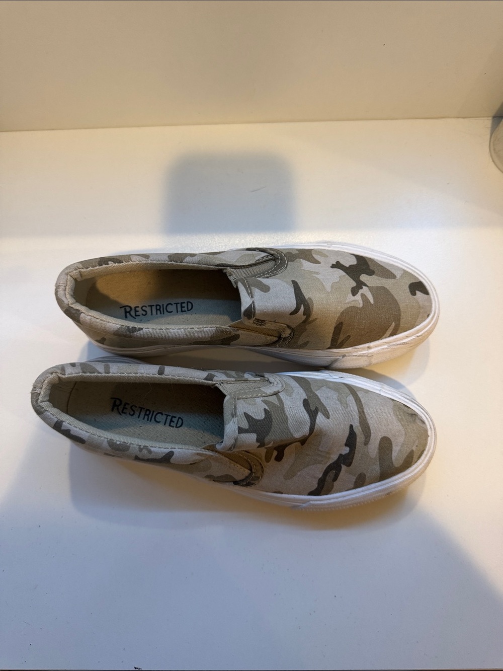 Restricted Women's Slip-On Camo Sneakers in Beige and Olive